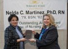 Photo of outstanding CoNH alumni Nelda Martinez and CoNH Dean Rosalie Mainous.