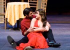 Photo of a couple sitting on the stage.