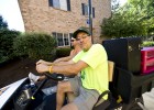 Michael Schulze drives a golf cart at freshman move-in day 2010.