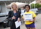 Photo of Lisa Wiseman- Volunteer with American Cancer Society presents certificate to Jyna Griffin- Wright State student with College Students against Cancer at Relay for Life 2012.