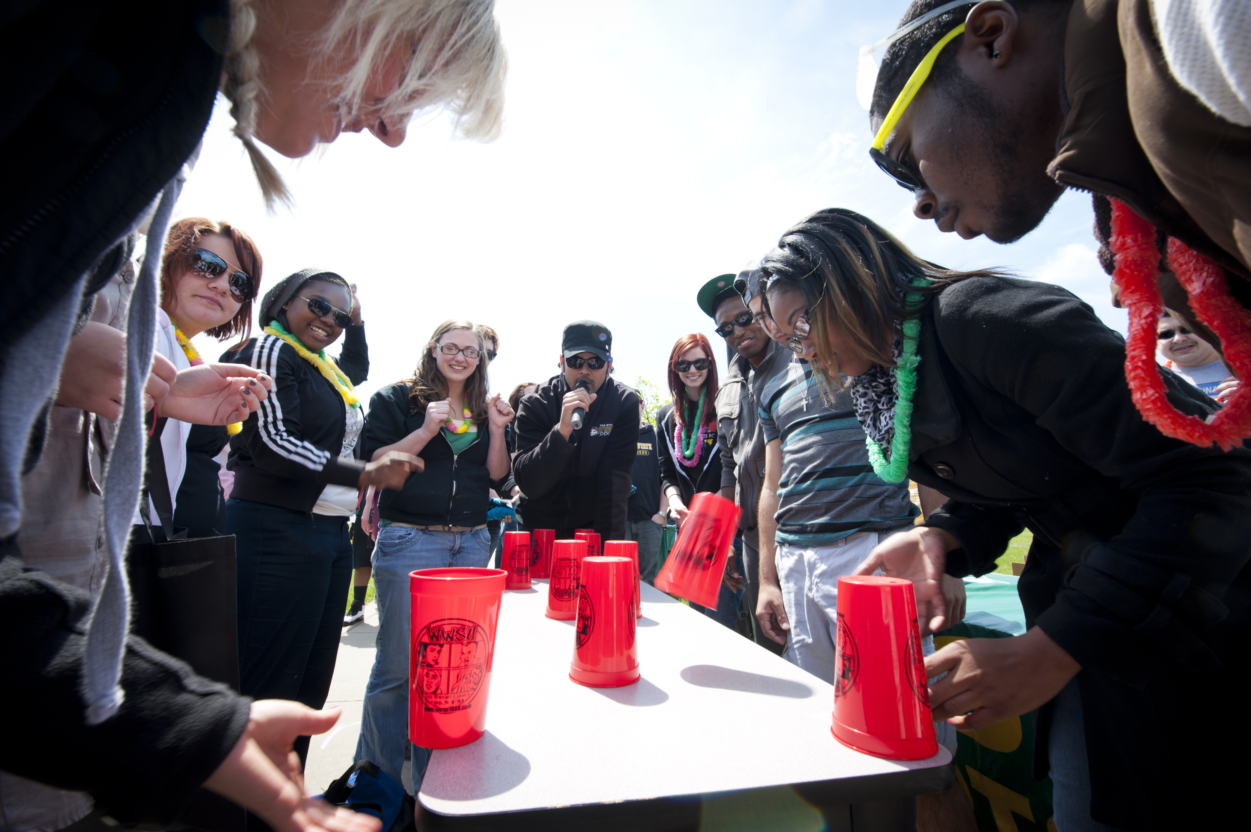 Photo of students playing flip-cup.