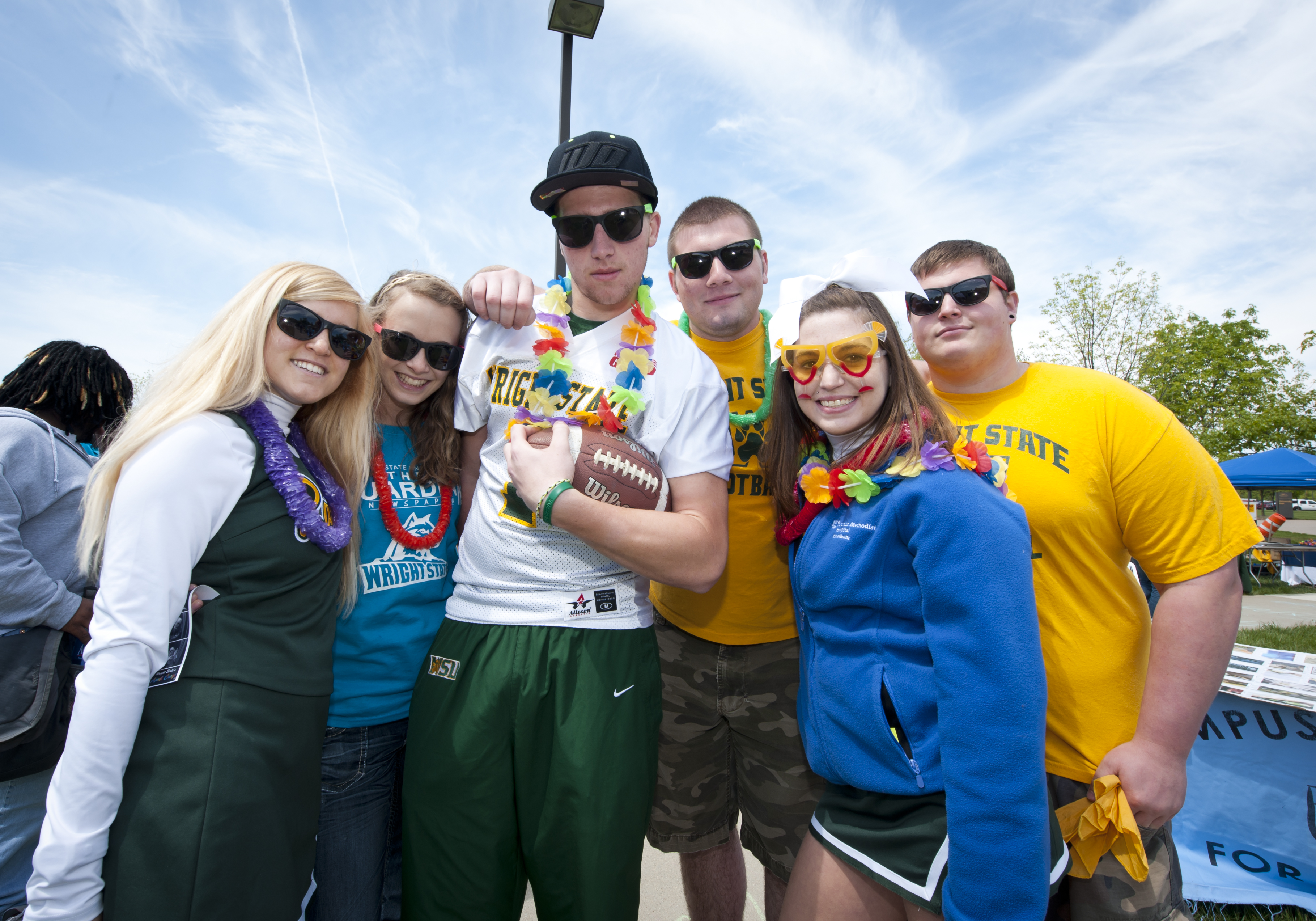 Photo of Wright State football players and cheerleaders hamming it up at April Craze.
