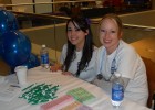 Photo of two students at a table.