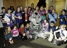 Photo of Rowdy Raider and dozens of kids who participated in the 2012 Take our Daughters and Sons to Work Day at Wright State.