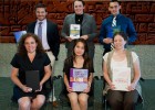 Photos of the six top scholars with their books.