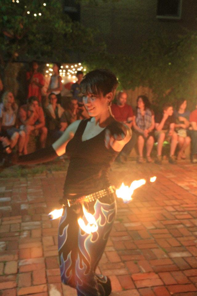 Photo of Wright State recent graduate Lara Donnelly fire dancing.