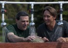 Photo of Chuck Ciampaglio, Ph.D., Associate Professor, Geology/Paleontology-WSU Lake Campus and Jim Sharits, VP production Technifex rinsing dirt from the tooth of a preshistoric megalodon shark .