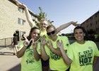 Student volunteers made WSU hand signals to show their pride.