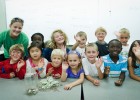 Photo of students in Miss Kelly's Lemonade Stand class. Campers learned about counting the money they earn selling lemonade. All proceeds were donated to the Humane Society.