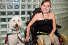 Mallory Holler with her service dog Sparrow