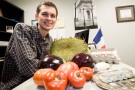French instructor Benjamin Hirt shows off homemade cheese