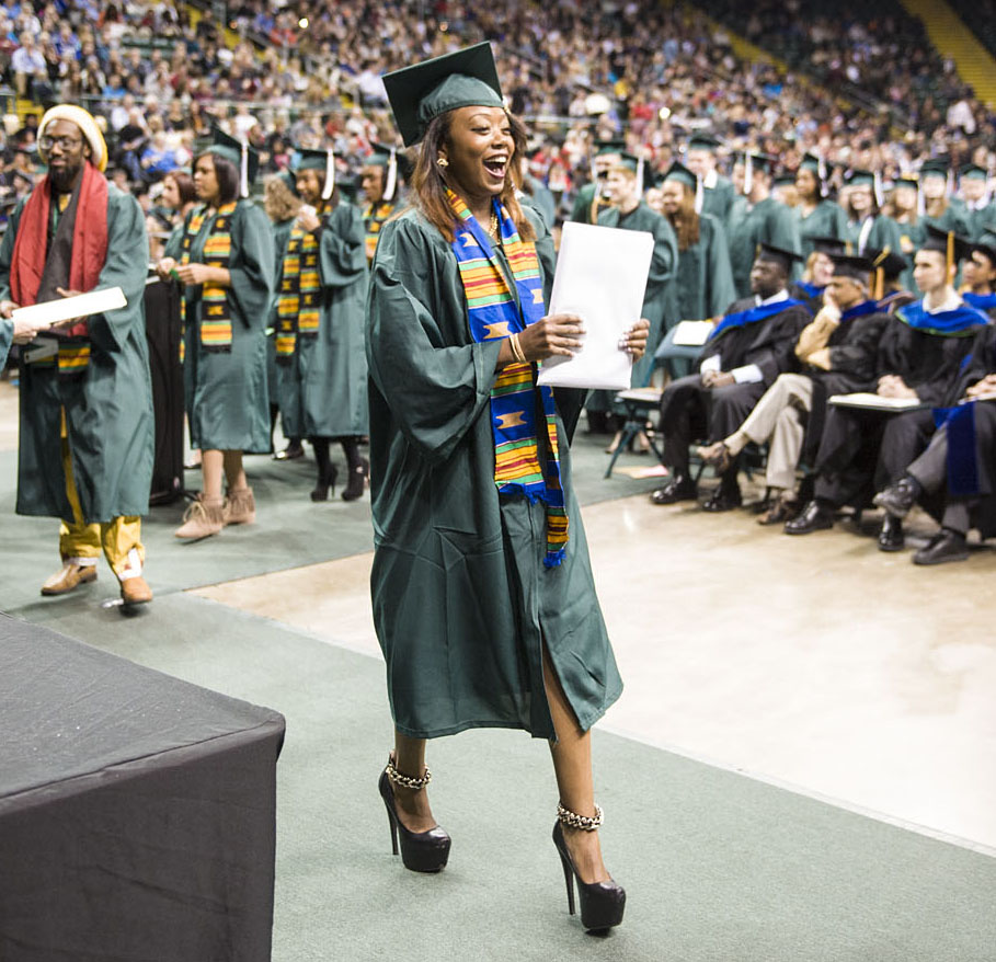 Graduate receives diploma
