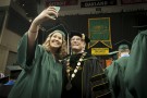 Graduate takes selfie with President Hopkins
