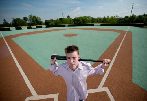 William Crotty with bat at Dayton's Miracle League baseball field