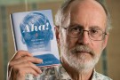 William Irvine holding his book