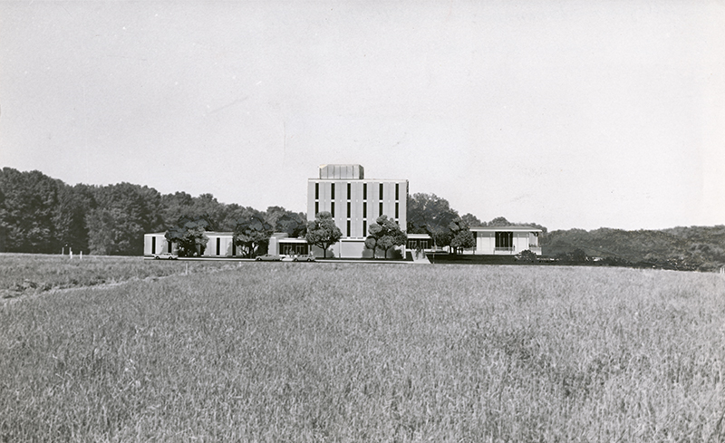 Historic photo of Allyn Hall in field of wheat