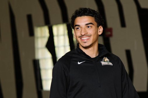 Jahi McDonald smiling inside the gym. 