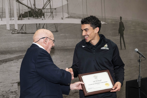 McDonald is presented with his award for earning the Jo Ann Self Memorial Scholarship in marketing. 