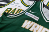 Two Wright State basketball jerseys laying overlapped with a Premier Health patch in the corner of each.