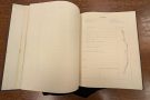 Orville Wright's botany sketchbook opened to a page depicting a plant.
